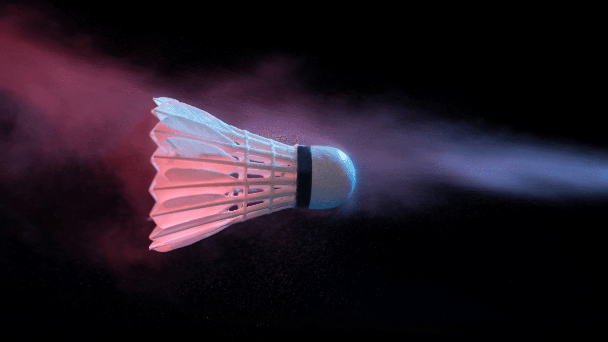 Badminton shuttlecock with dramatic lighting