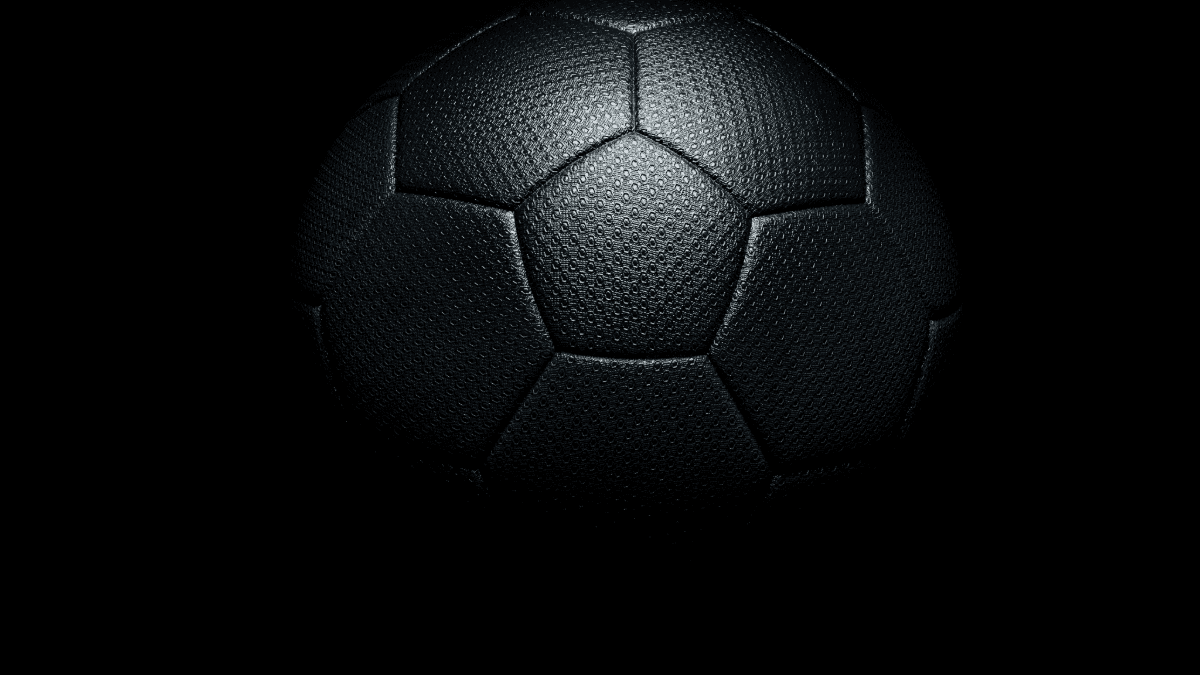 Soccer ball in dramatic lighting